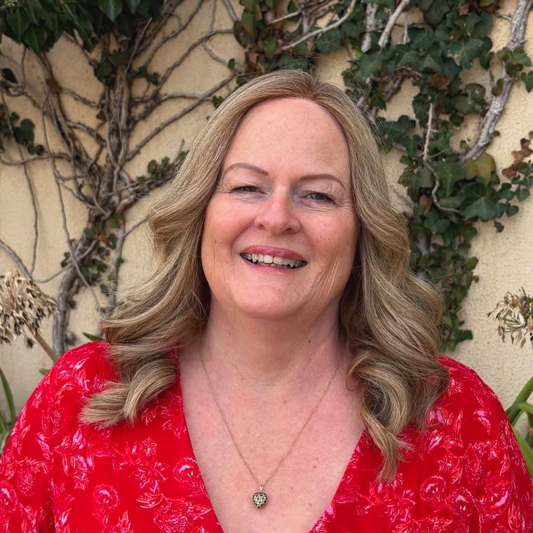 Smiling woman with a bonded hair topper