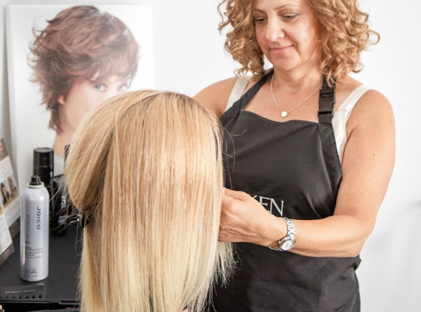 Photo of a human hair wig being maintained