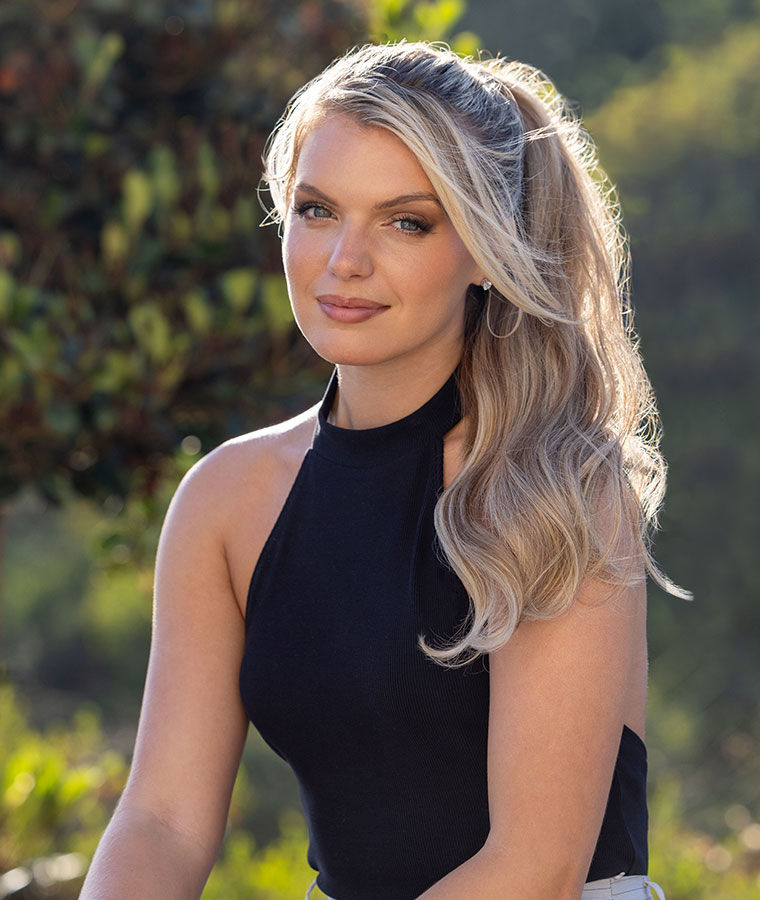 Smiling woman with clip-in hair extensions