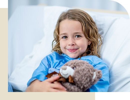 Photo of a young girl having cancer treatment wearing a wig